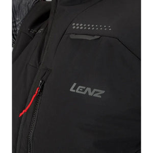 Close up of black Lenz vest with red zipper pull and reflective detailing