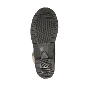 Black rubber lug sole of a Kamik winter boot
