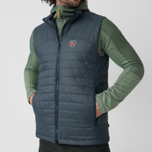 Fjallraven dark blue quilted vest with zipper pockets and brand logo patch