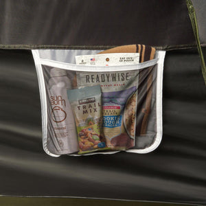 Kelty tent interior mesh storage pocket filled with food pouches and sunscreen