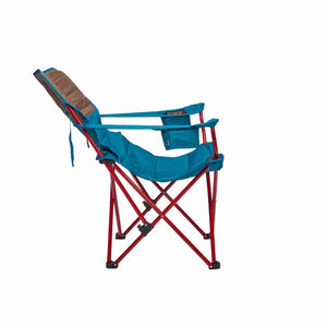 Side view of a blue and brown Kelty folding camping chair with a red metal frame