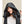 Person wearing a black Kelvin hooded vest with adjustable drawstrings