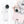White portable handheld fan with digital display being placed into a small handbag with dimensions 6.7 by 2 inches