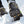Korkers traction cleats on a boot walking through snow