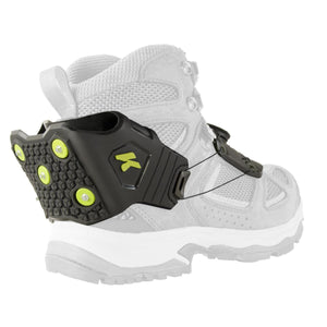 Korkers traction cleat attached to the heel of a hiking boot