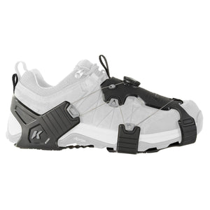 Korkers traction cleat attached to a light grey shoe