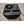 Mattress Cooler black cooling unit with fan and power dial on tiled floor