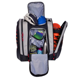 Open black and grey ski boot backpack packed with ski gear and accessories