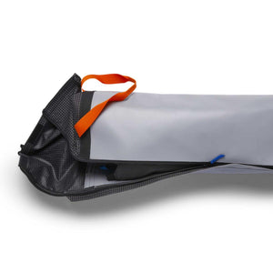 Grey and black grid patterned gear bag with orange carry strap