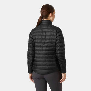 Back view of a woman wearing a black Helly Hansen quilted puffer jacket