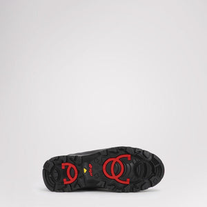 Black Pajar boot sole with red traction details