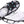 Due North ice cleats attached to a white athletic shoe