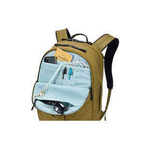 Thule backpack with open front pocket showing internal organization for pens phone and accessories