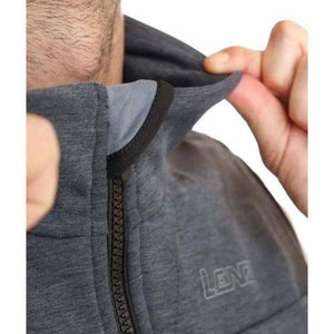 Close up of a person adjusting the collar of a grey Lenz jacket