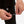 Hands connecting power cable to Venture Heat base layer garment