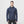 Man wearing a navy blue Heat Experience hooded zip up jacket