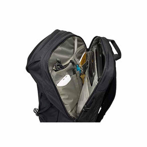 Open Thule backpack showing internal organization pockets and laptop sleeve