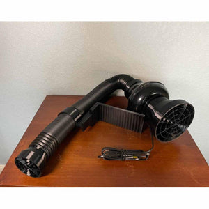 Mattress Cooler black air hose and fan unit on a wooden surface