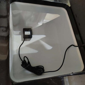 Mattress Cooler water pump inside a white reservoir
