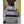 Three Alpicool portable refrigerators stacked vertically on a tiled floor