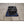 Mattress Cooler unit with black fan housing and control dial on a blue cooling pad