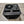 Mattress Cooler black cooling unit with fan and power dial on tiled floor