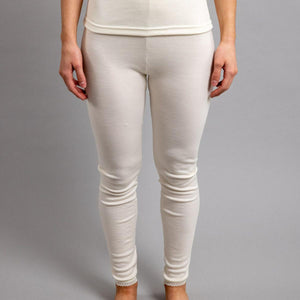 Merino Skins cream thermal leggings with lace trim at the ankles