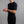 Man wearing a black Merino Skins short sleeve crew neck base layer top