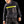 Man wearing a Miracool cooling vest over a black sweatshirt and work trousers
