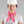 Woman wearing a white hard hat and a pink Miracool cooling neck wrap