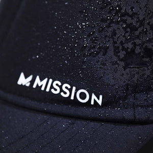 Close up of a black Mission cap with water droplets on the fabric
