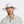 Man wearing a white Mission wide brim sun hat with a chin strap