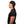 Man wearing a black Mission cooling skull cap from the side
