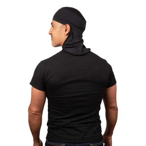 Man wearing a black cooling skull cap with neck shade
