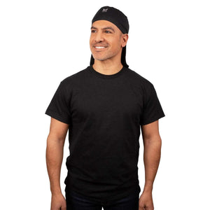 Man wearing a black Mission cooling skull cap