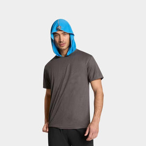 Man wearing a grey Mission t-shirt with a blue cooling hood pulled up