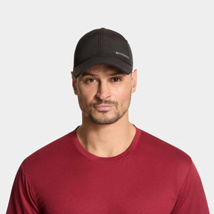 Man wearing a black Mission baseball cap and a maroon crew neck shirt