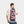 Man wearing a cream t-shirt with a Mission cooling towel featuring USA flag print draped over his shoulder