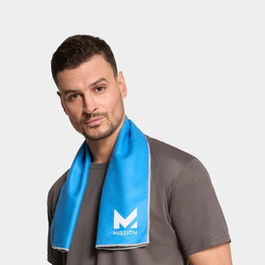 Man wearing a blue Mission cooling towel around his neck