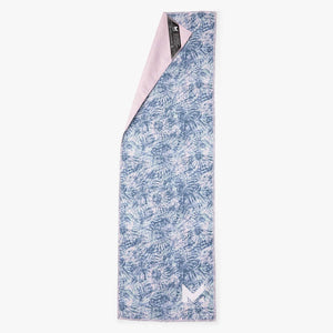 Mission cooling towel with blue and white tie dye pattern and folded corner showing light pink underside