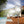 Misty Mate pedestal misting fan on a wooden pool deck