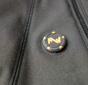 Close up of a black and orange heated jacket power button with a logo