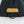Mobile Warming black fabric with tan leather patch and black nylon pull tab