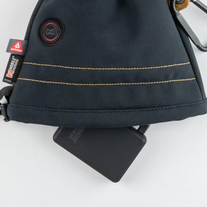 Mobile Warming black pouch with power bank and Primaloft branding