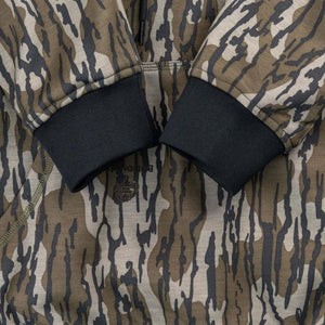 Mobile Warming hoodie sleeves with black ribbed cuffs and Mossy Oak camouflage pattern