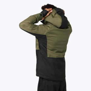 Back view of a person wearing a Mobile Warming olive green and black hooded jacket
