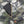 Black power bank inside a zippered pocket of a camouflage patterned Ultra jacket
