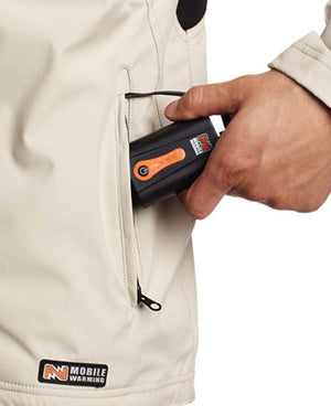 Hand placing a Mobile Warming battery pack into a jacket pocket