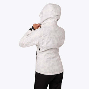 Back view of a Mobile Warming white hooded jacket with a geometric pattern worn over black pants