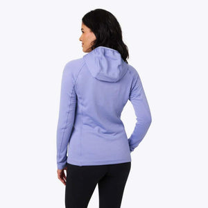 Back view of a woman wearing a light purple Mobile Warming hooded fleece jacket